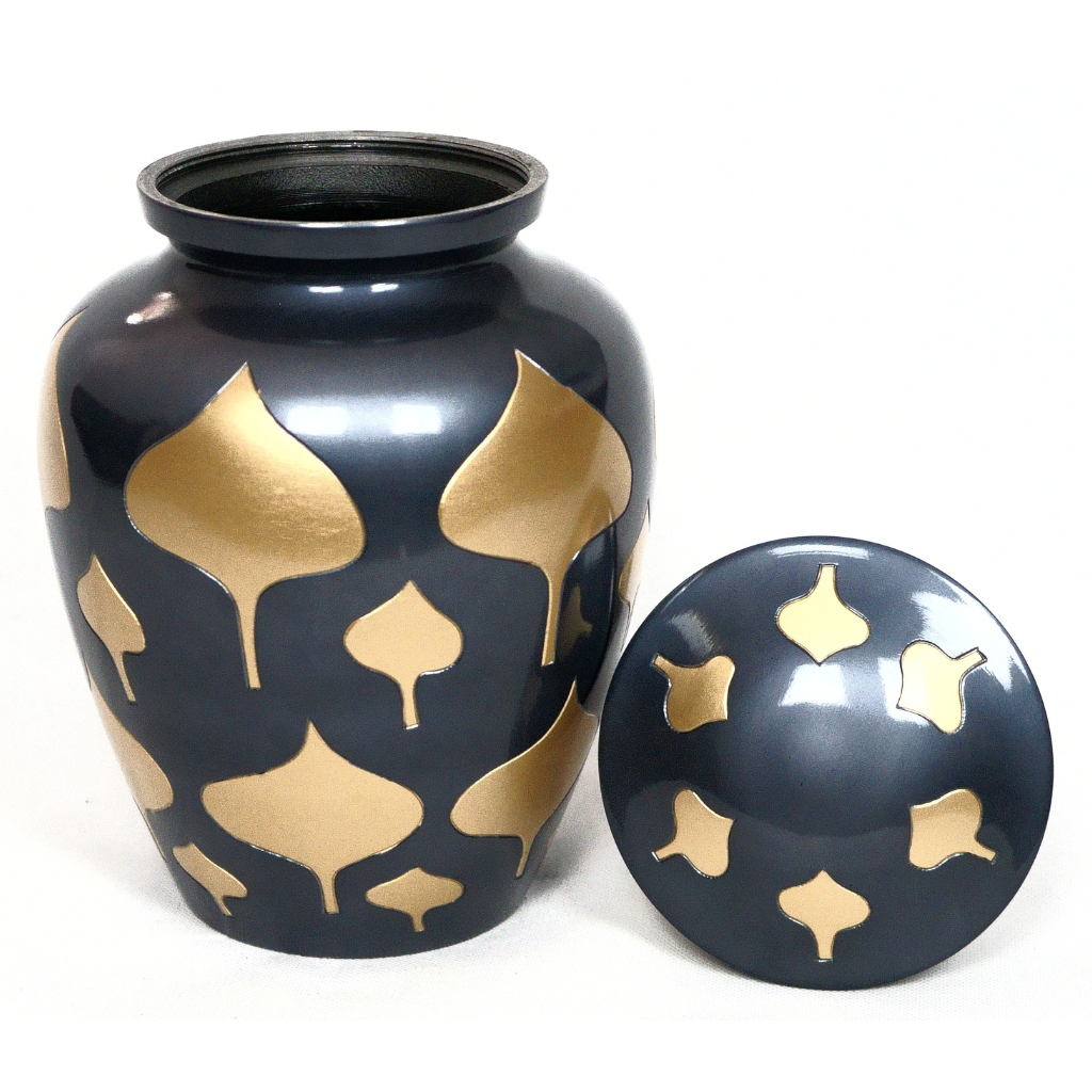 Black urn with gold leaf details lid off