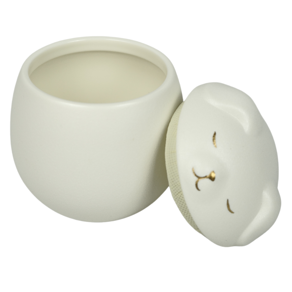 White canine companion ceramic urn lid off