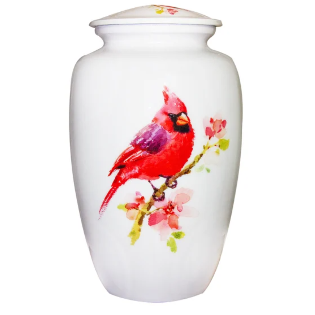 White urn with red cardinal bird 