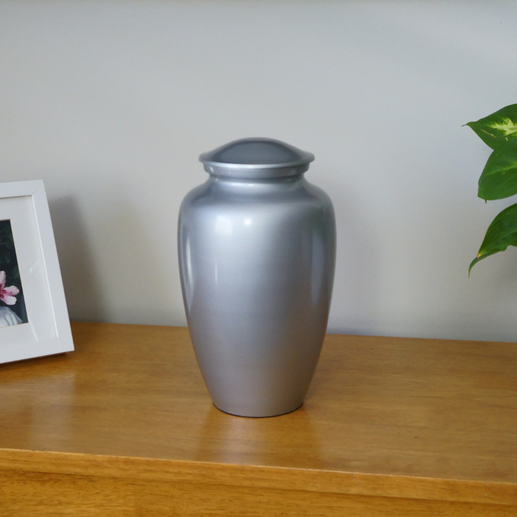 Silver plain urn in a natural home setting