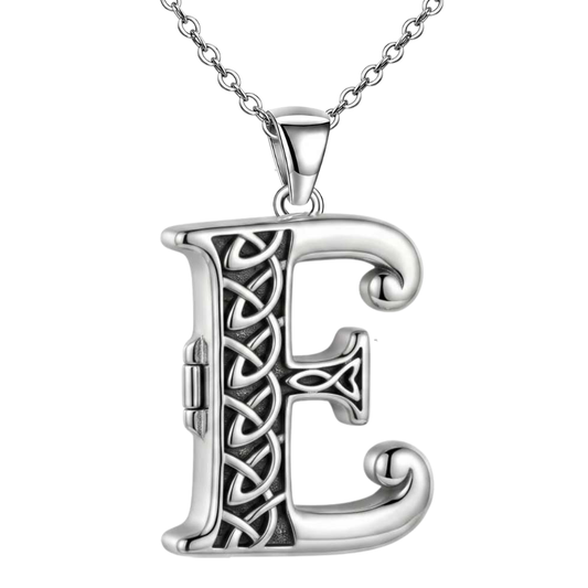 A sterling silver Celtic letter 'E' pendant necklace with an integrated locket, featuring intricate knotwork and cross details, suspended from a matching silver chain against a plain white background.