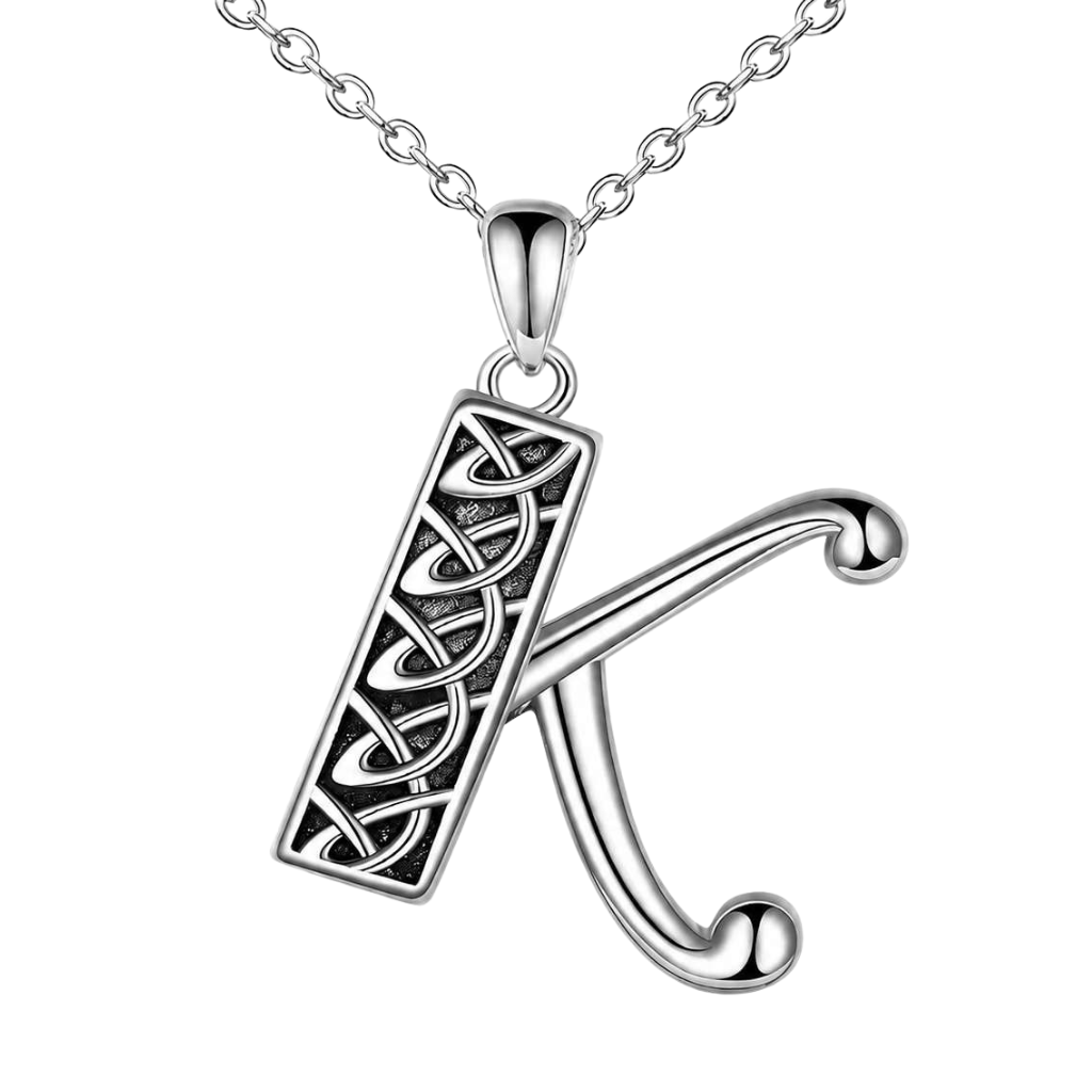 A silver initial pendant necklace featuring the letter 'K' with a Celtic knot design on its vertical stem, suspended from a matching silver chain against a plain white background.