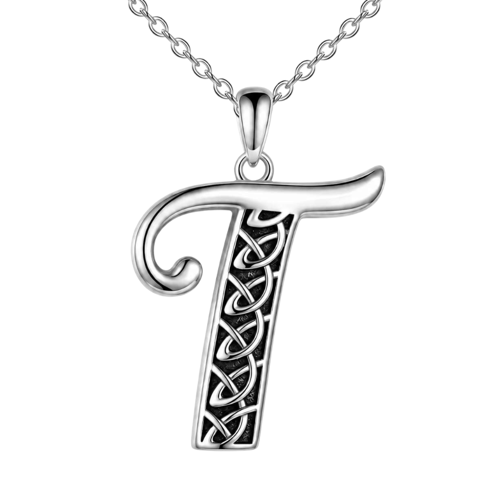 A sterling silver Celtic letter 'T' pendant necklace with an intricate knotwork design on the stem, hanging from a delicate silver link chain against a solid white background.