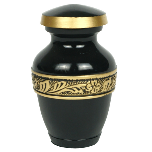 Black keepsake urn with gold leaf and flower detailing