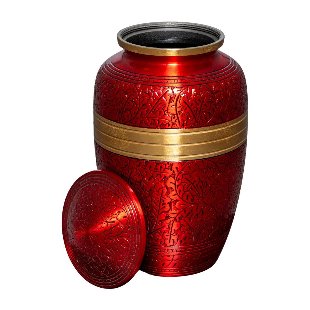 Red aluminium urn with intricate engravings and a gold detail