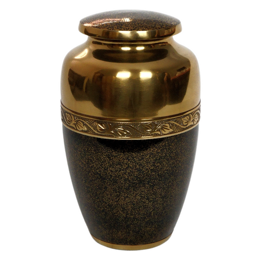 Brass urn with black speckled details on the bottom half