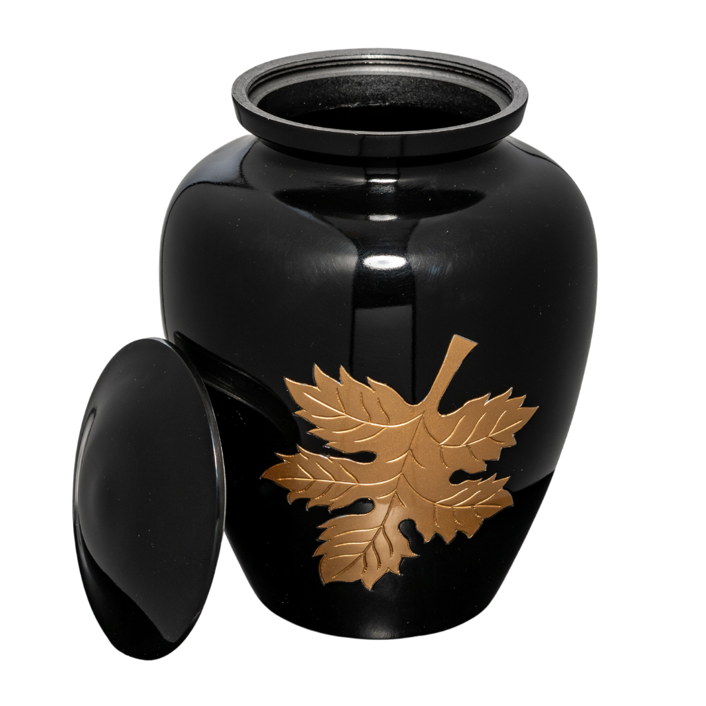 Black urn with gold autumn leaf etched